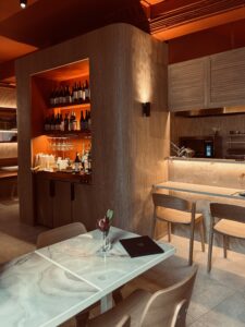 Open kitchen with onyx bar & orange cocktail station 