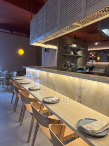 Open kitchen restaurant with onyx bar 