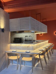 Open kitchen restaurant with onyx bar